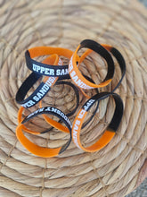 Load image into Gallery viewer, Orange + Black Upper Sandusky Rams Printed Wristband - Youth + Adult Sizes
